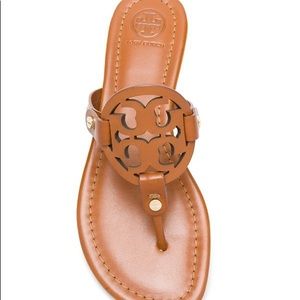 lightly worn tory burch flip flops